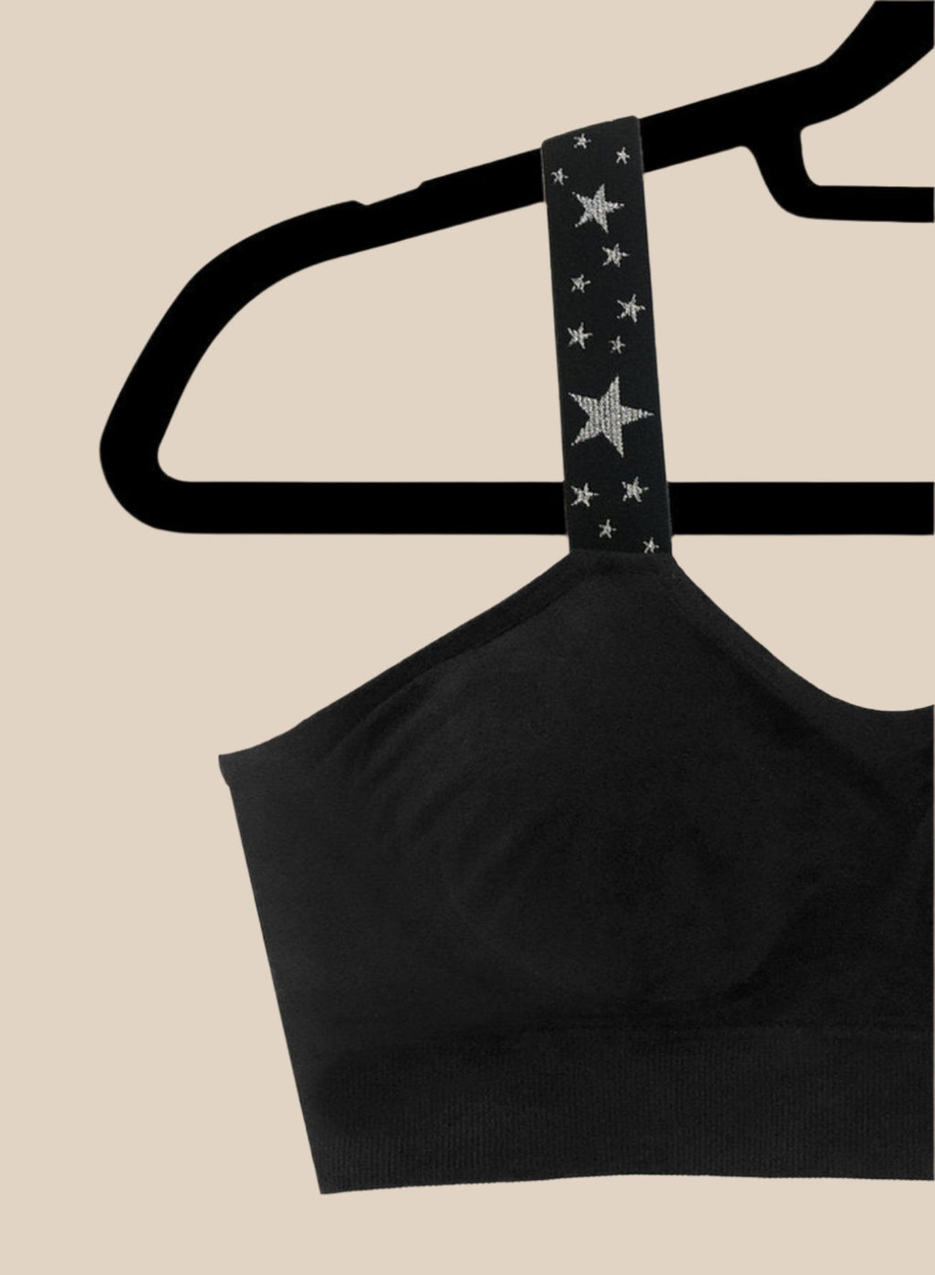 METALLIC SILVER STAR (attached to black bra)